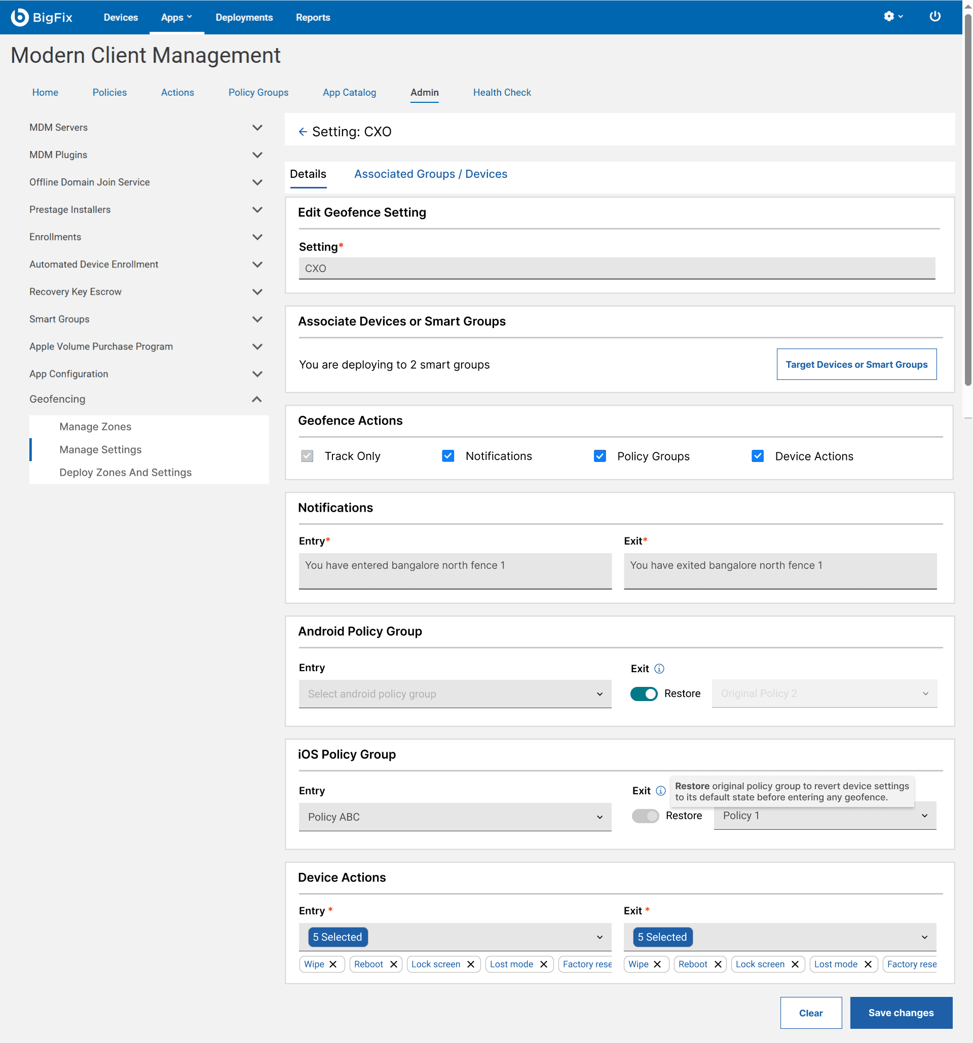 Editing a geofence setting named CXO, with Details and Associated Groups tabs and a tooltip explaining that Restore reverts a device to its original policy group.