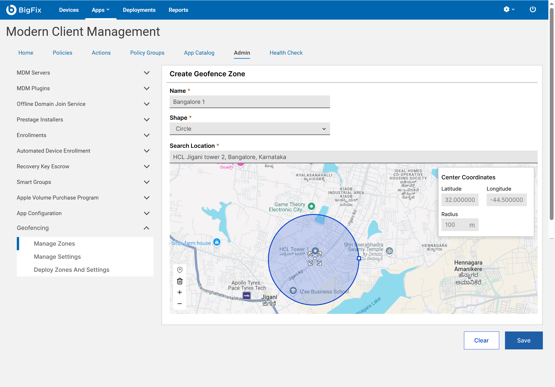 The Create Geofence Zone screen in BigFix MCM, with a circular geofence drawn on a map of Bangalore and its center coordinates and radius shown beside it.