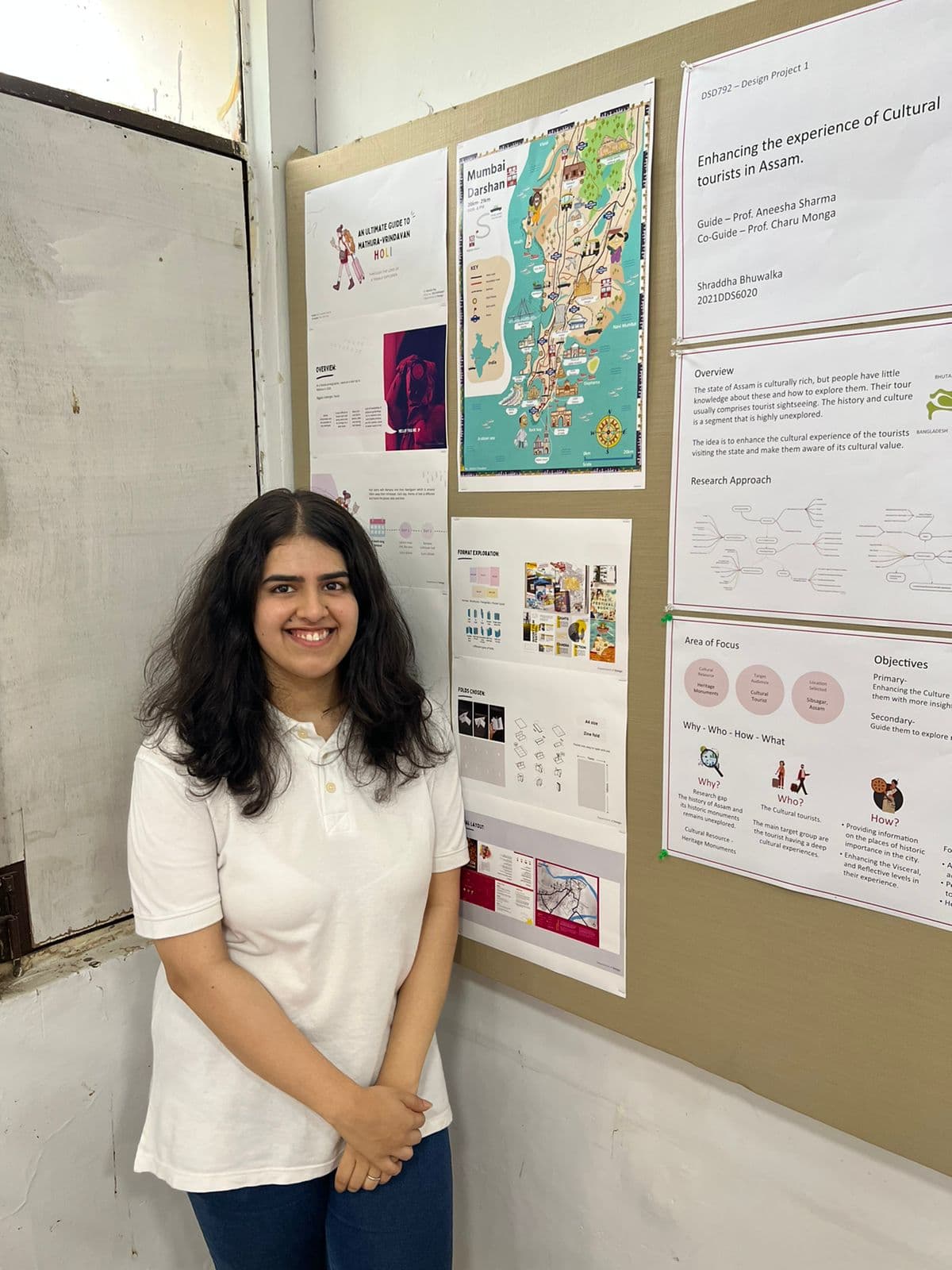 Drushti Choudhari standing beside her design project posters at IIT Delhi.